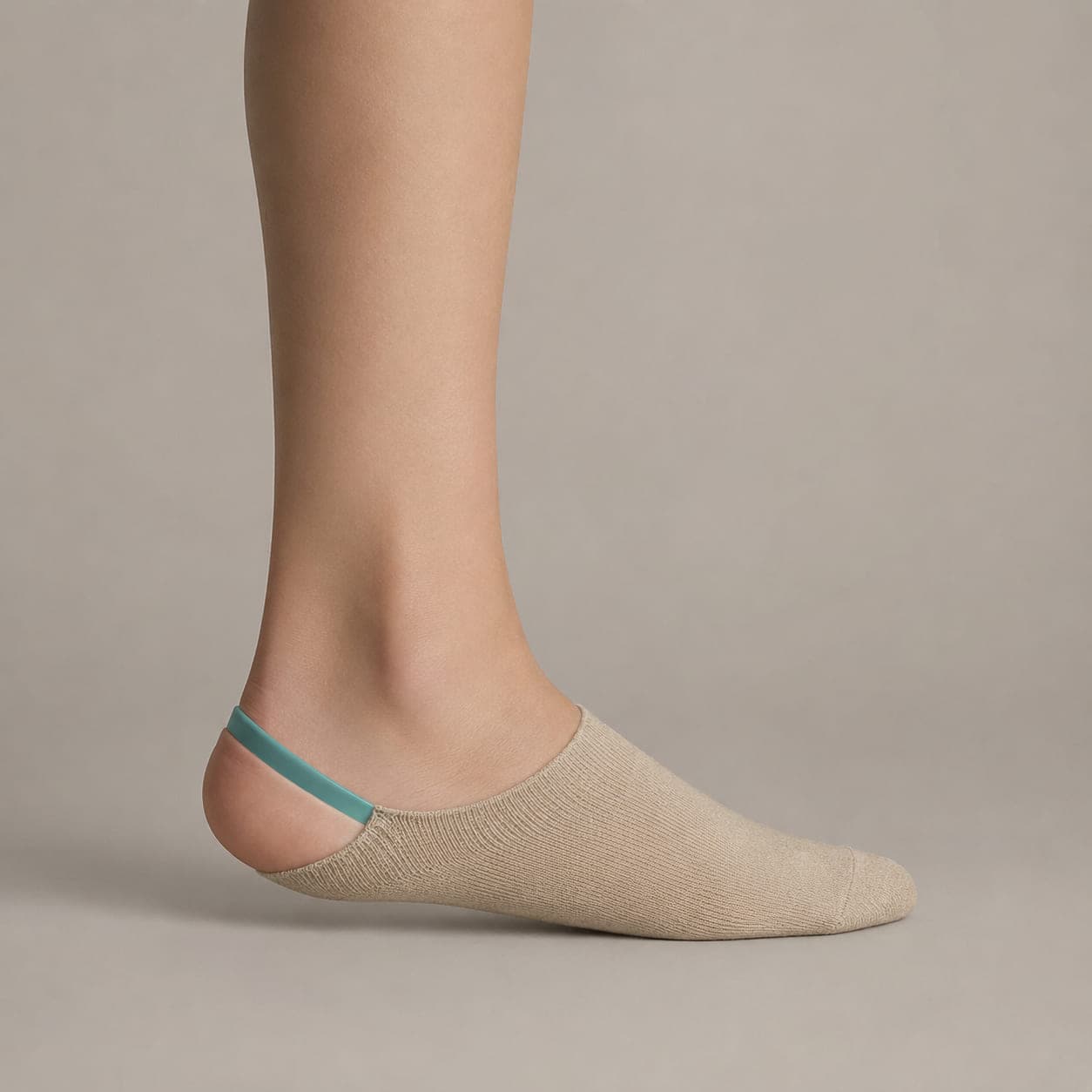Deep 26 Arc worn on a foot, seen from the side, with the cuff edge visible above the heel.