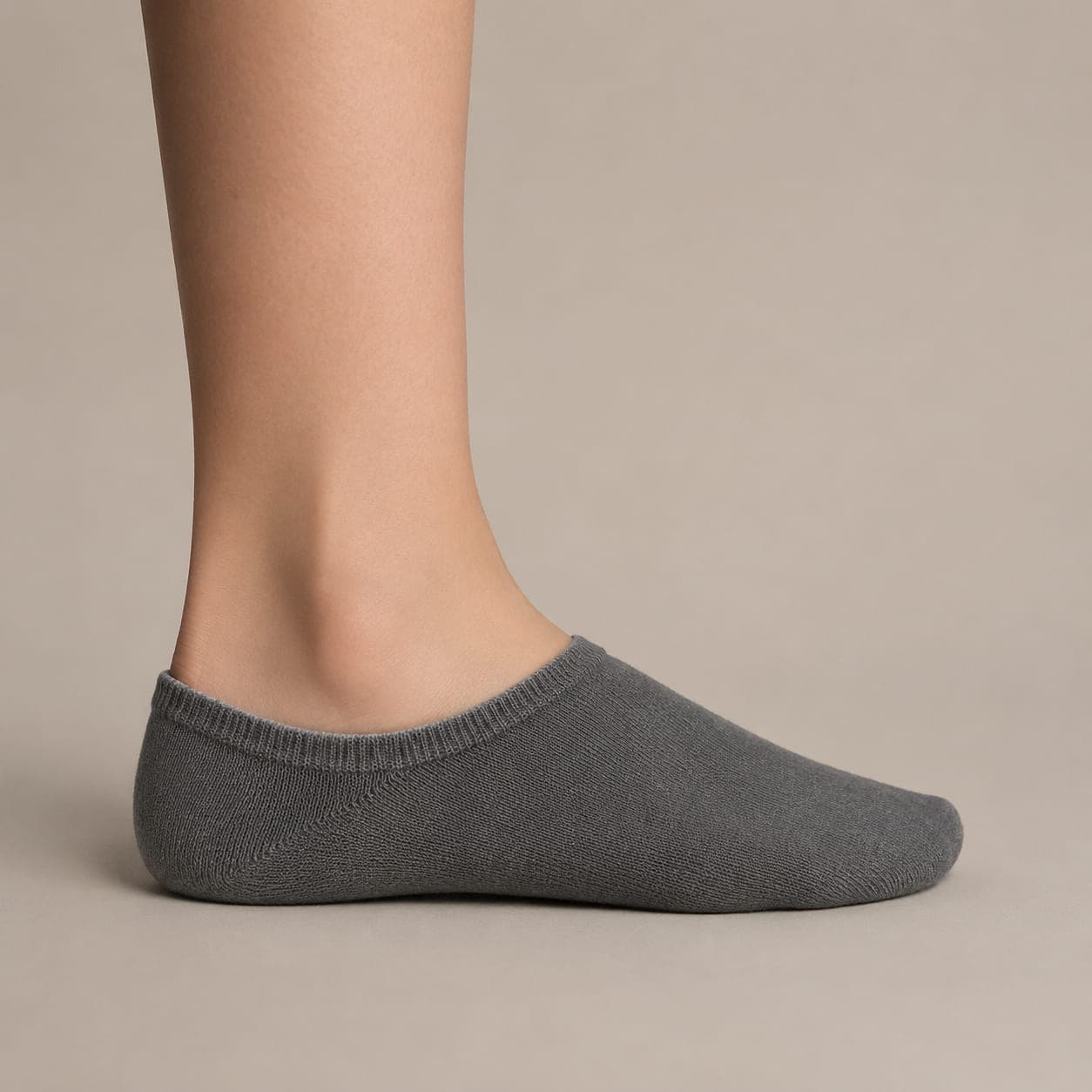 Boat 52 Rib worn on a foot, seen from the side, with the cuff edge visible above the heel.