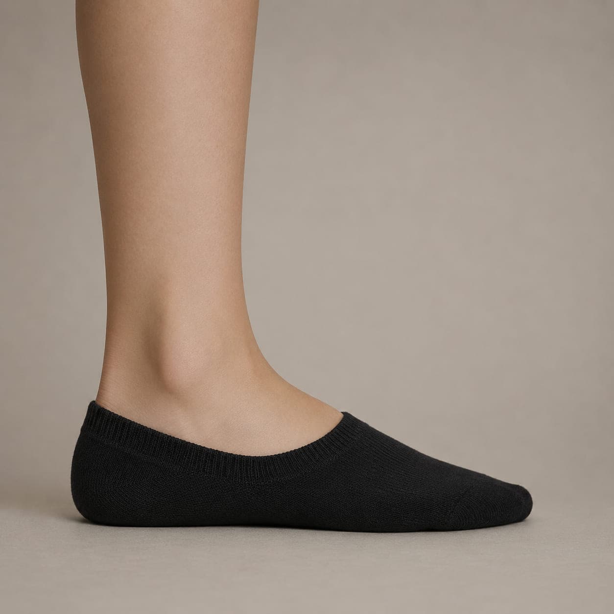 Boat Premium worn on a foot, seen from the side, with the cuff edge visible above the heel.