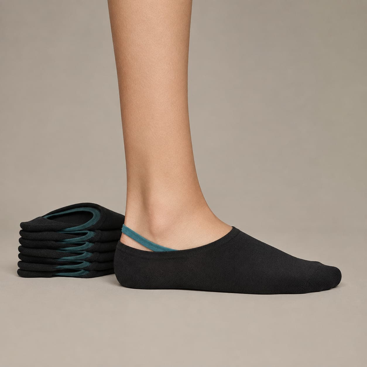 Hidden 38 three-pack worn on a foot, seen from the side, with the cuff edge visible above the heel.