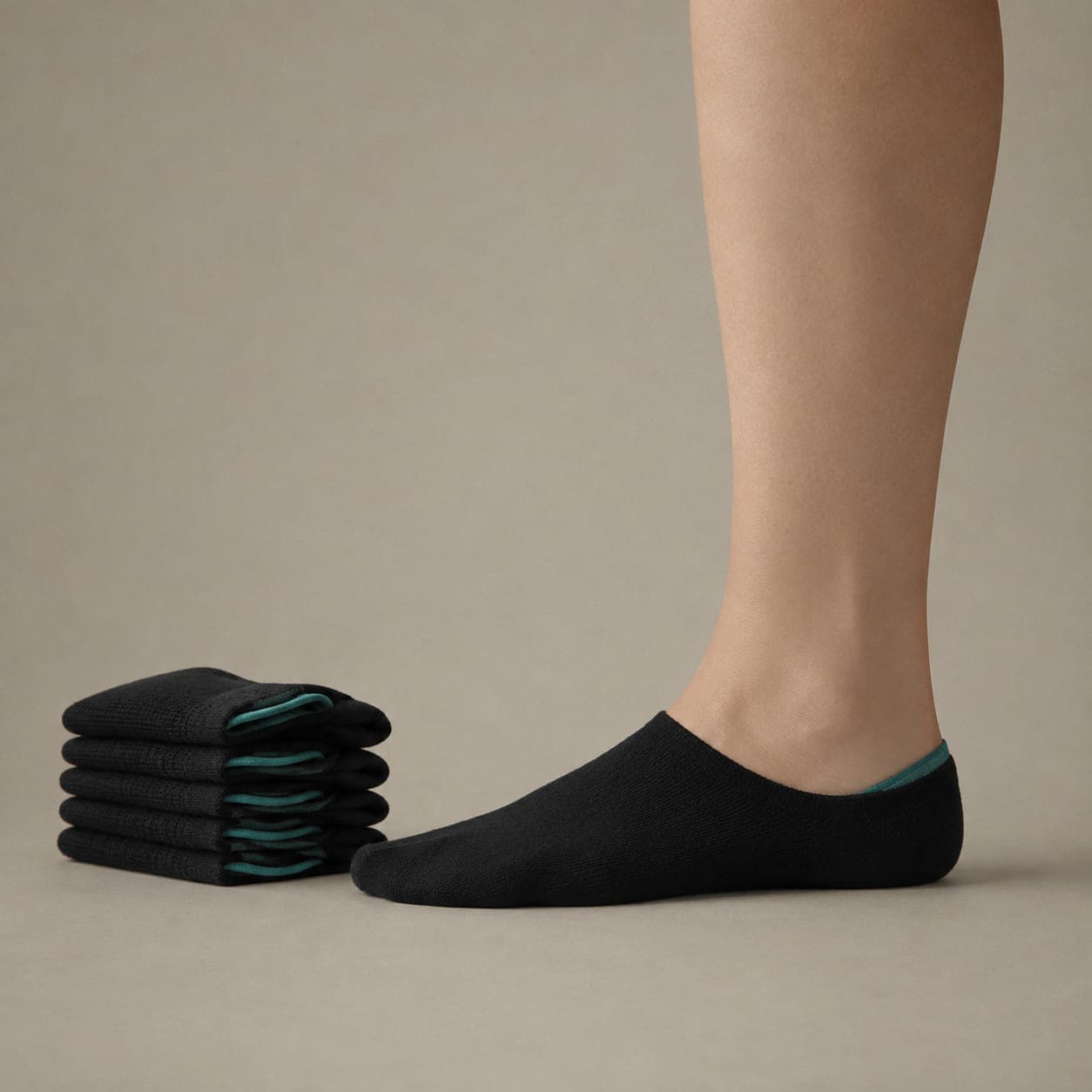 Hidden 38 twelve-pack worn on a foot, seen from the side, with the cuff edge visible above the heel.